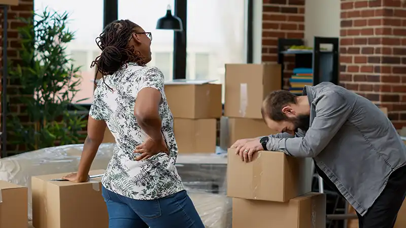 life partners carrying boxes of furniture to move 2023 11 27 05 21 16 utc copy